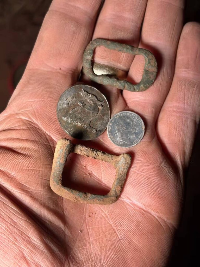 lovely finds from a georgian buckle, to edward 7th silver three pence, and a stunning livery button.