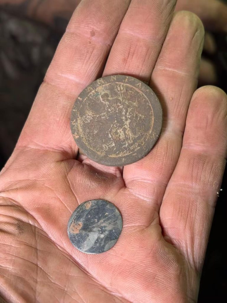 1797 cartwheel Penny and a Silver William 3rd Love token.