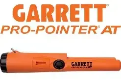 Orange Garrett Pro-Pointer AT metal detector with a black tip.